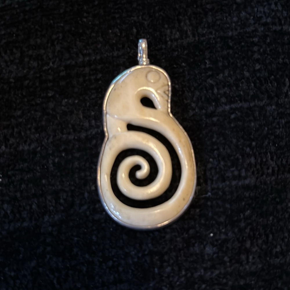 Doreen Cordova Jewlery from California
Bone and Sterling Silver - Picture 3 of 3